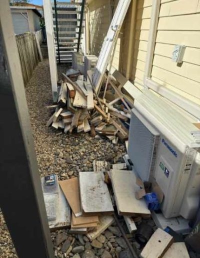 Side of house with garden waste 400x516 1